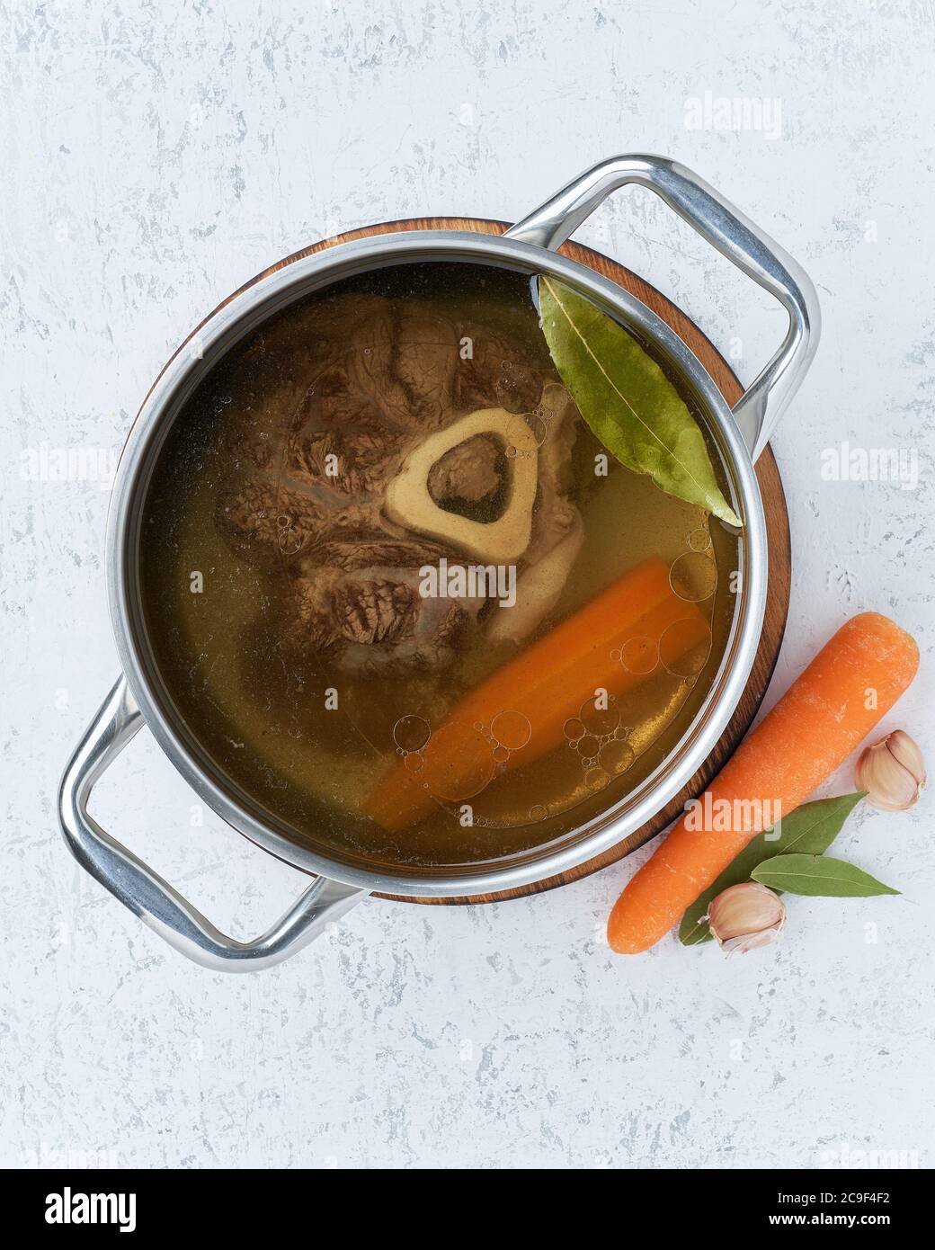 Paleo bone broth diet, beef meat soup. Low-carb food, keto recipe. Stock Photo