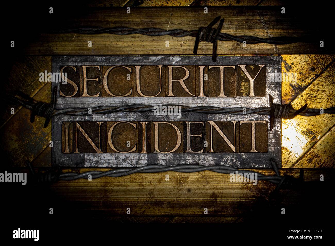 Security Incident text formed with real authentic typeset letters on ...