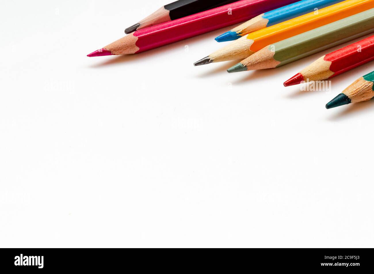 Colored pencils close up on white background Stock Photo
