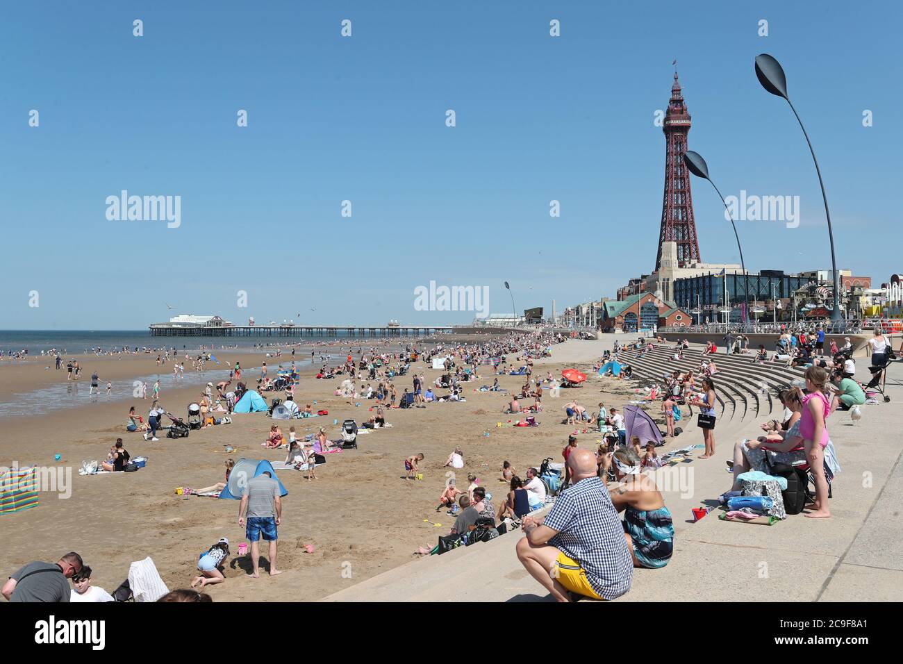 People enjoy the hot weather at Blackpool beach. The Met Office says it
