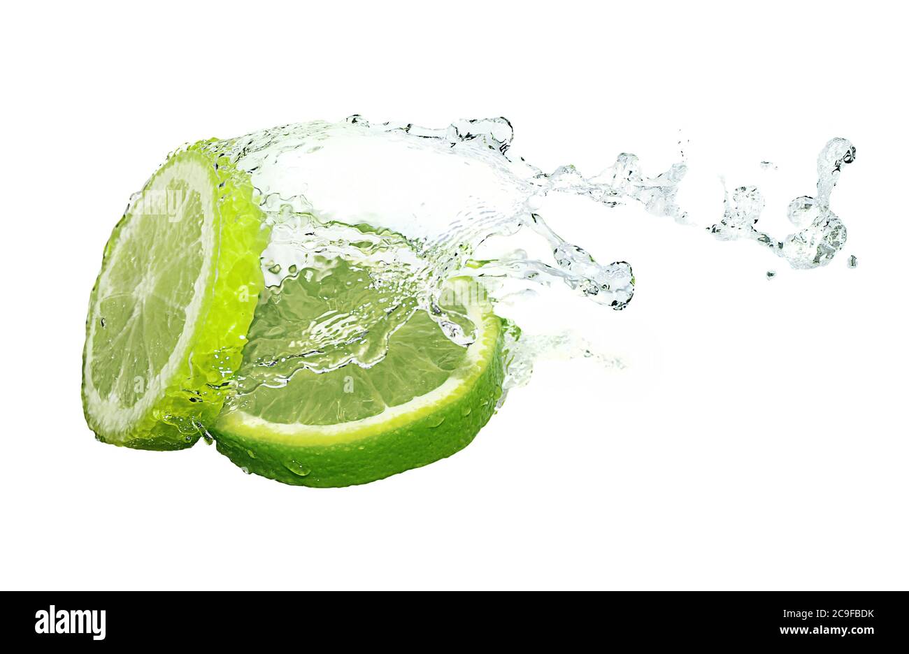Water splash on lime slices Stock Photo