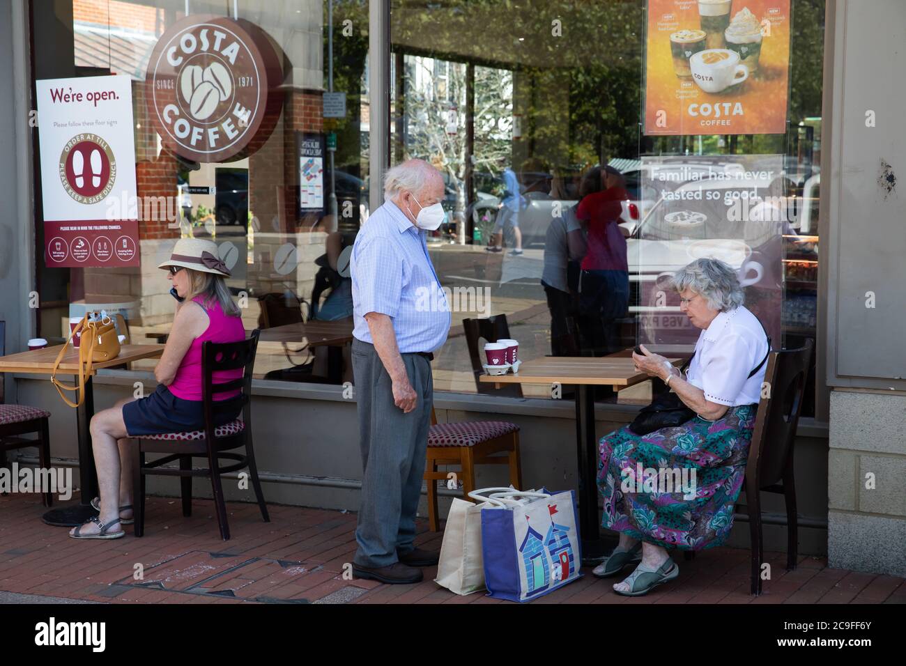 Sevenoaks,Kent,31st July 2020,People dine Alfresco outside Costa Coffee on the Hottest Day of the year in Sevenoaks, Kent. The forecast is for 32C sunny with a gentle breeze and is to be cooler for the weekend.Credit: Keith Larby/Alamy Live News Stock Photo