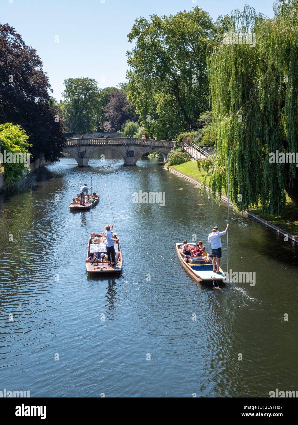 Cambridge UK 31st July 2020. People enjoy punting on the River Cam on the  hottest day of the year so far in the UK. Temperatures are forecast to  reach 36 degrees centigrade