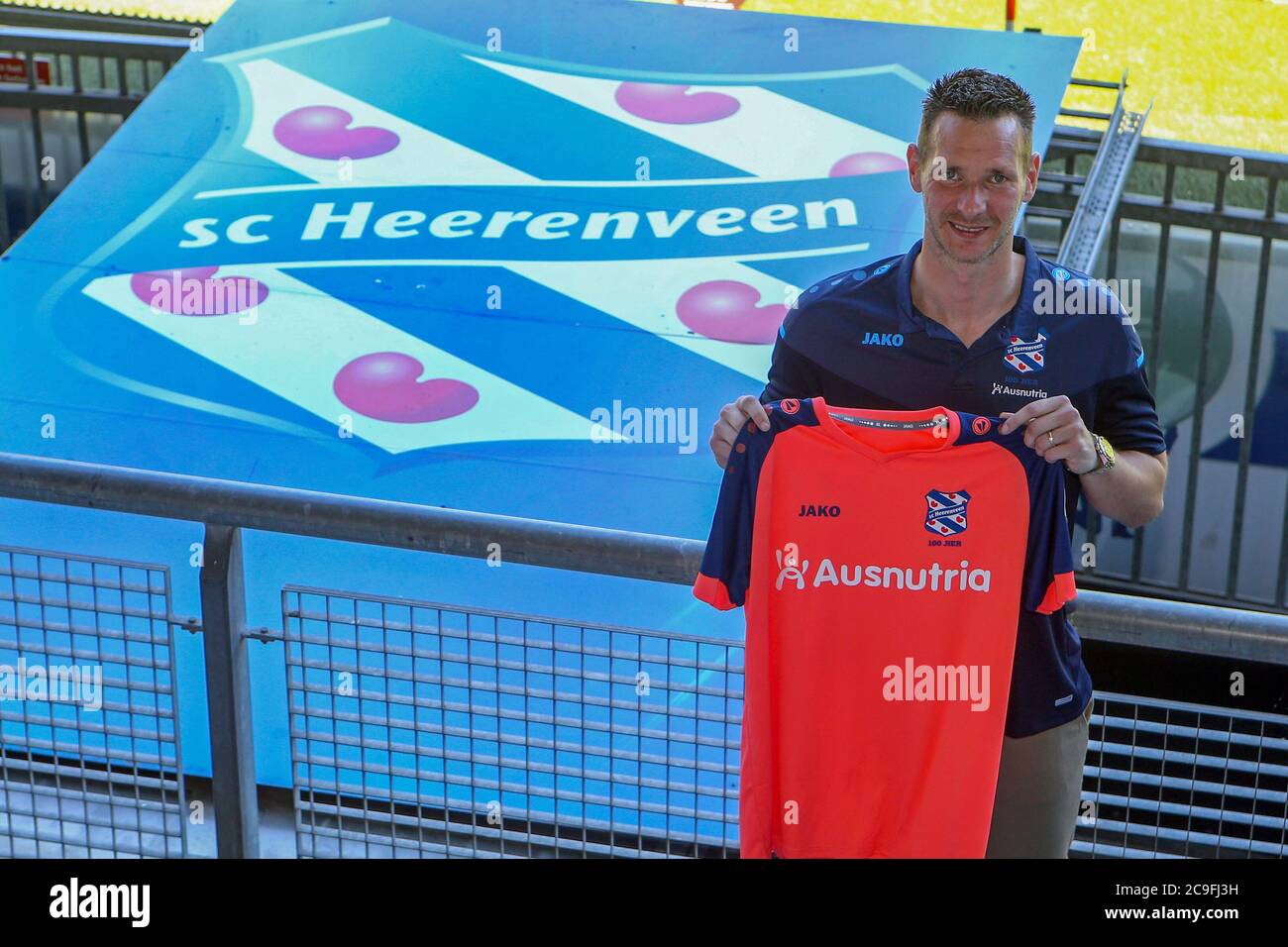 HEERENVEEN, NETHERLANDS - JULY 31: Erwin Mulder seen after his presentation as new player of SC Heerenveen posing with a shirt in the stadium on July 26, 2020 in Heerenveen, The Netherlands. Stock Photo