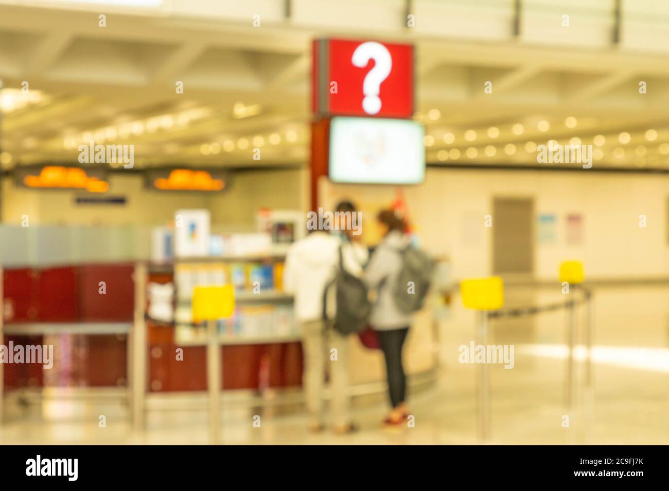 Blurred Information Desk With People Asking And Answering Questions Blurred Information Desk With People Asking And Answering Questions