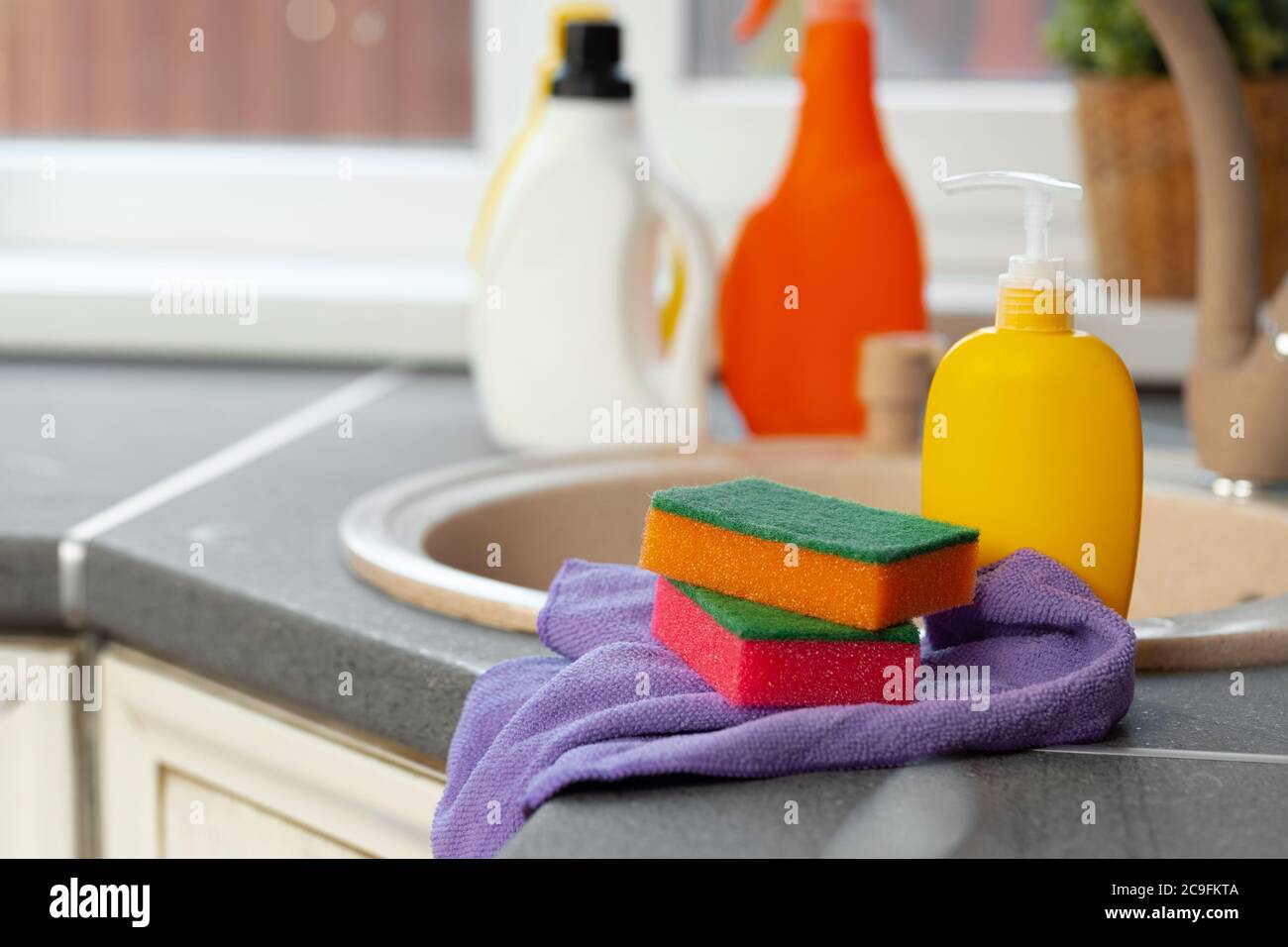 Cleaning supplies and tools on shelves and cabinets in pantry room Stock  Photo - Alamy