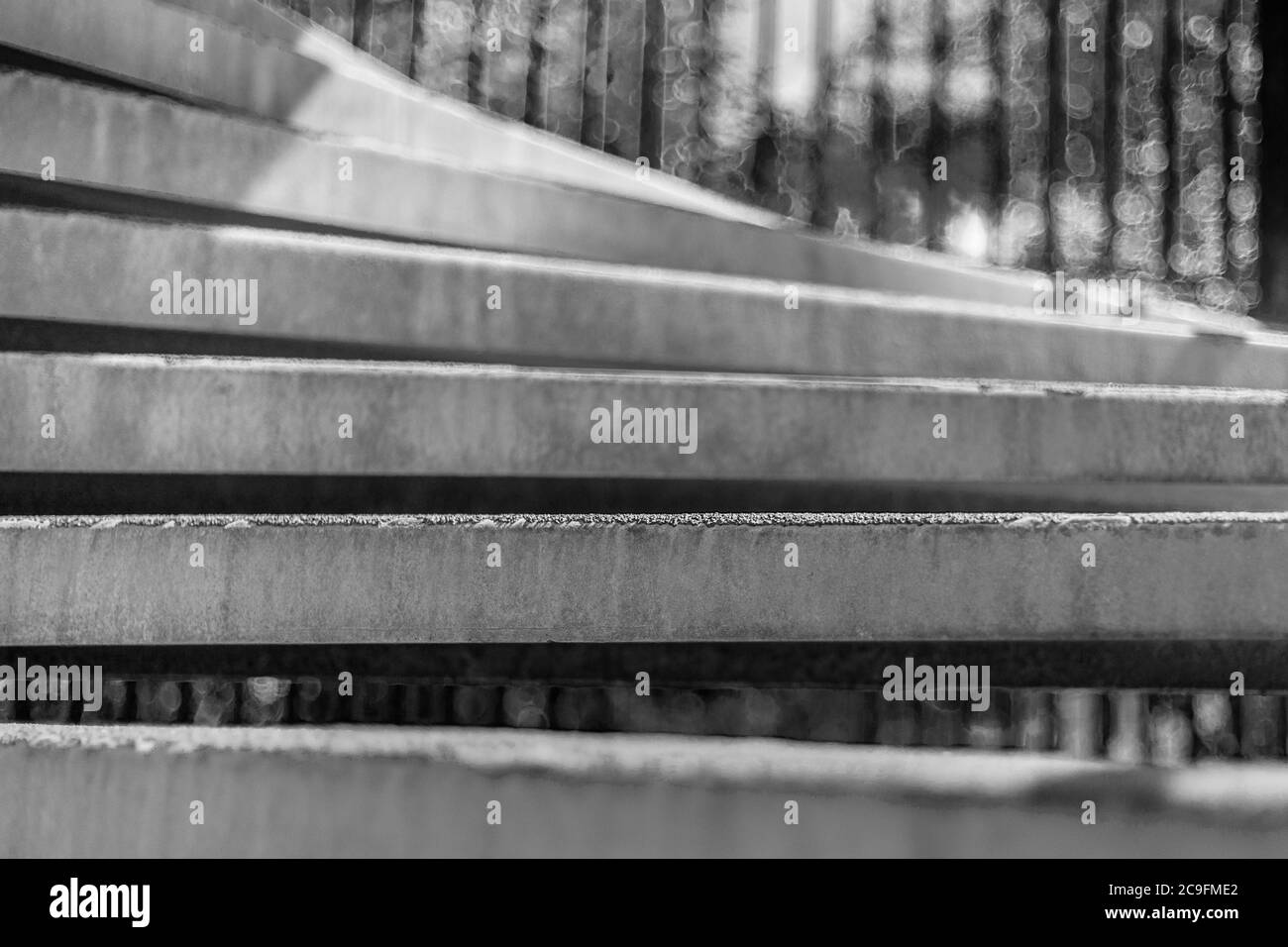 Steel step detail in monochrome. Stock Photo