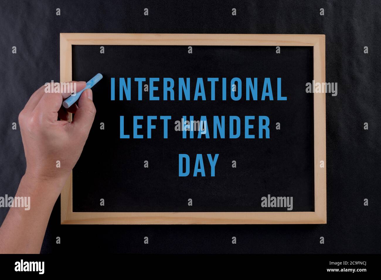 https://c8.alamy.com/comp/2C9FNCJ/man-writing-by-left-hand-left-hander-day-concept-international-lefthanders-day-2C9FNCJ.jpg