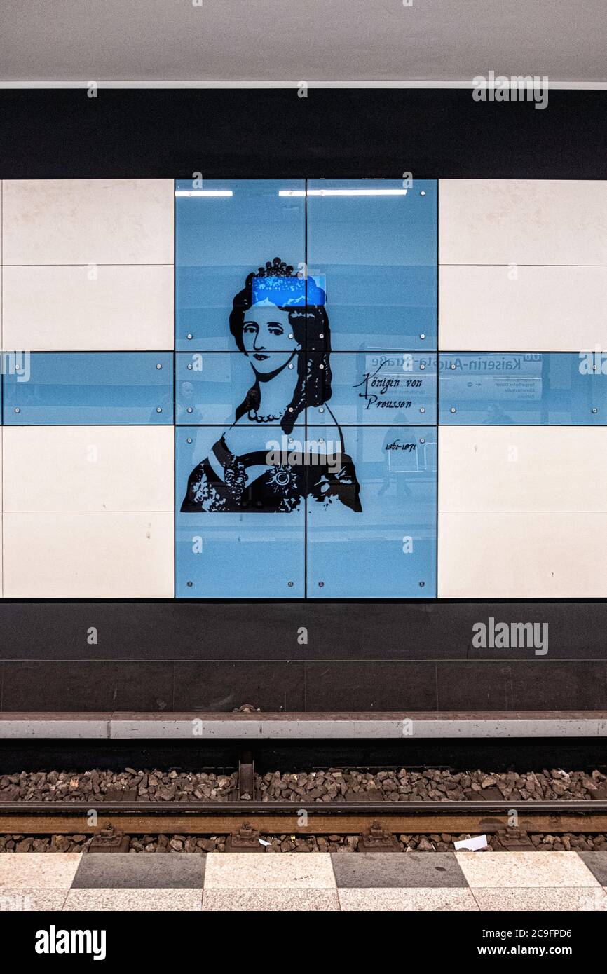 The Kaiserin-Augusta-Strasse U-Bahn underground railway station interior onU6 line in Tempelhof-Berlin.Blue & white tiled wall monochrome  portrait. Stock Photo