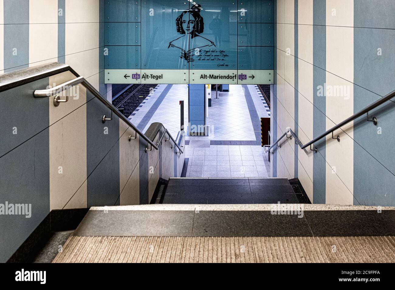The Kaiserin-Augusta-Strasse U-Bahn underground railway station interior on the U6 line in Tempelhof-Berlin.Blue & white tiled wall with stairway Stock Photo