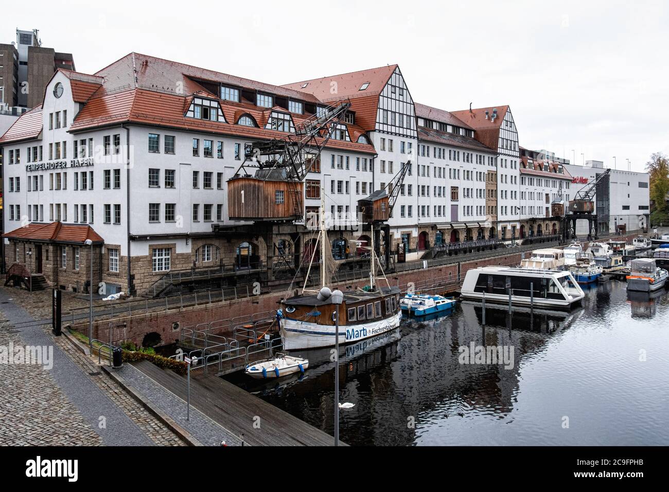 Germany, Berlin. Tempelhof Harbour warehouse. Historic listed building has been restored and is now houses shops & restaurants Stock Photo