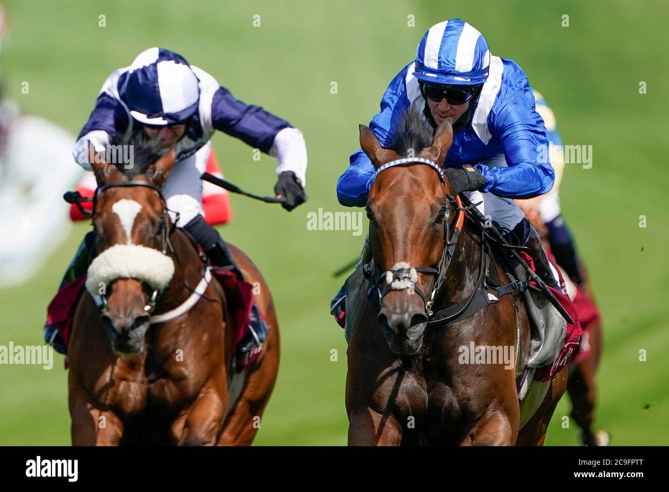 Battaash ridden by Jim Crowley (right) wins The King George Qatar Stakes during day four of the Goodwood Festival at Goodwood Racecourse, Chichester. Stock Photo