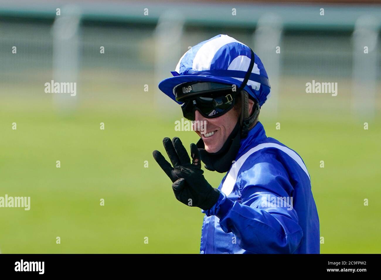 Jim Crowley celebrates winning The King George Qatar Stakes during day four of the Goodwood Festival at Goodwood Racecourse, Chichester. Stock Photo