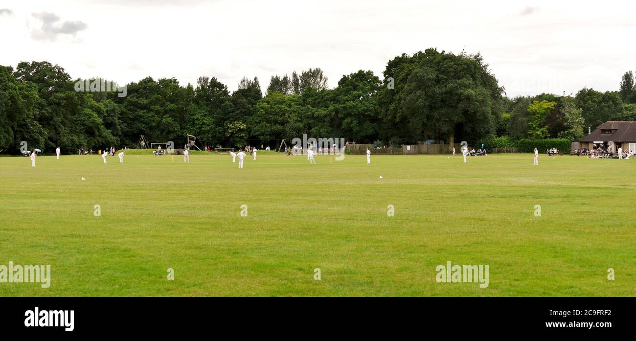 Frimley, Surrey, UK, 16 July 2016: A cricket match underway at Frimley Lodge Park in Surrey Stock Photo