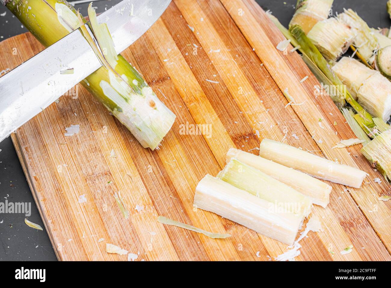 Cutting sugarcane hires stock photography and images Alamy