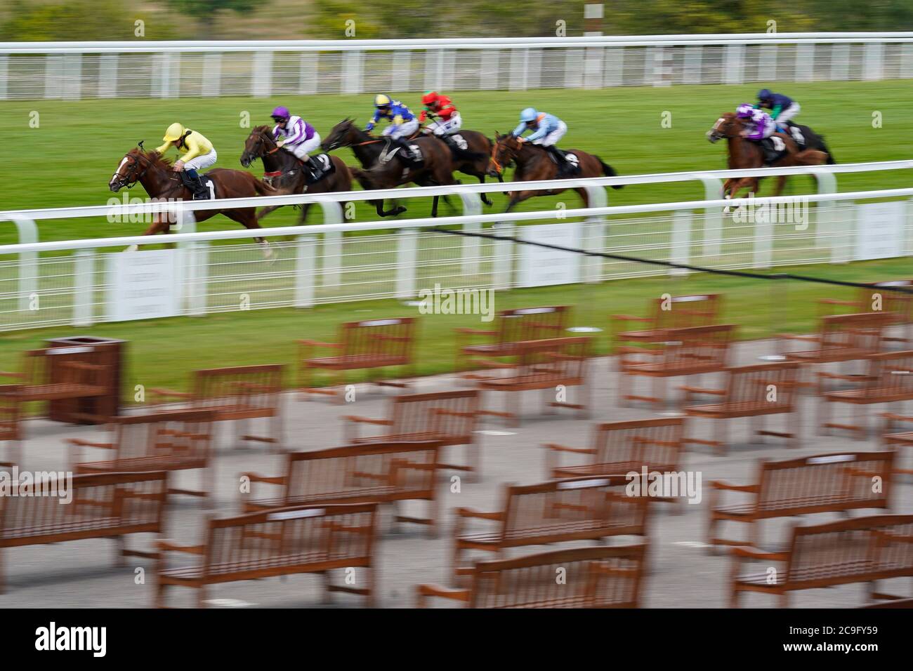 Zamaani ridden by William Buick (left) wins The New Unibet Instant Roulette Nursery during day four of the Goodwood Festival at Goodwood Racecourse, Chichester. Stock Photo