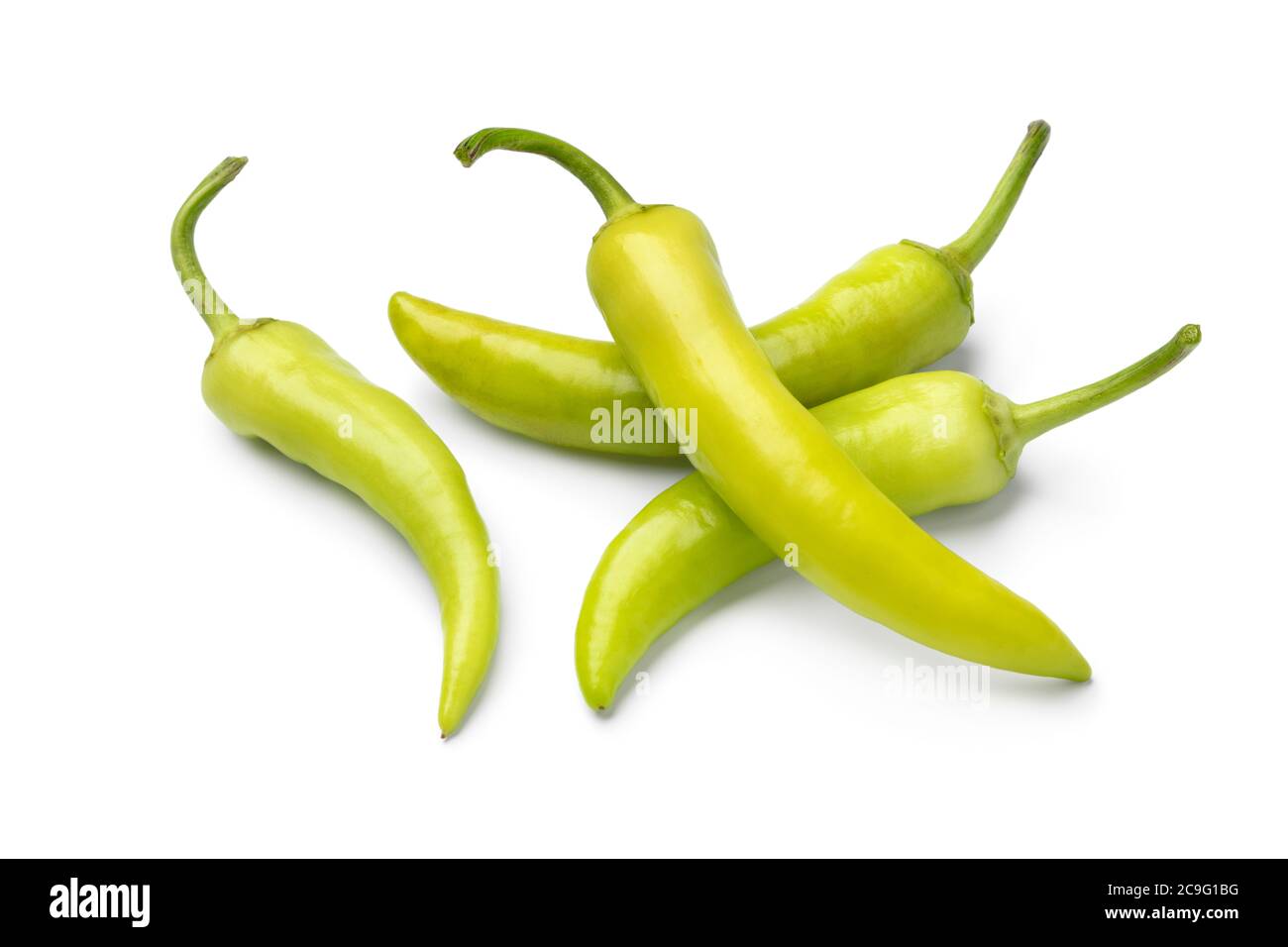 Heap of  young yellow Hungarian wax pepper close up isolated on white background Stock Photo