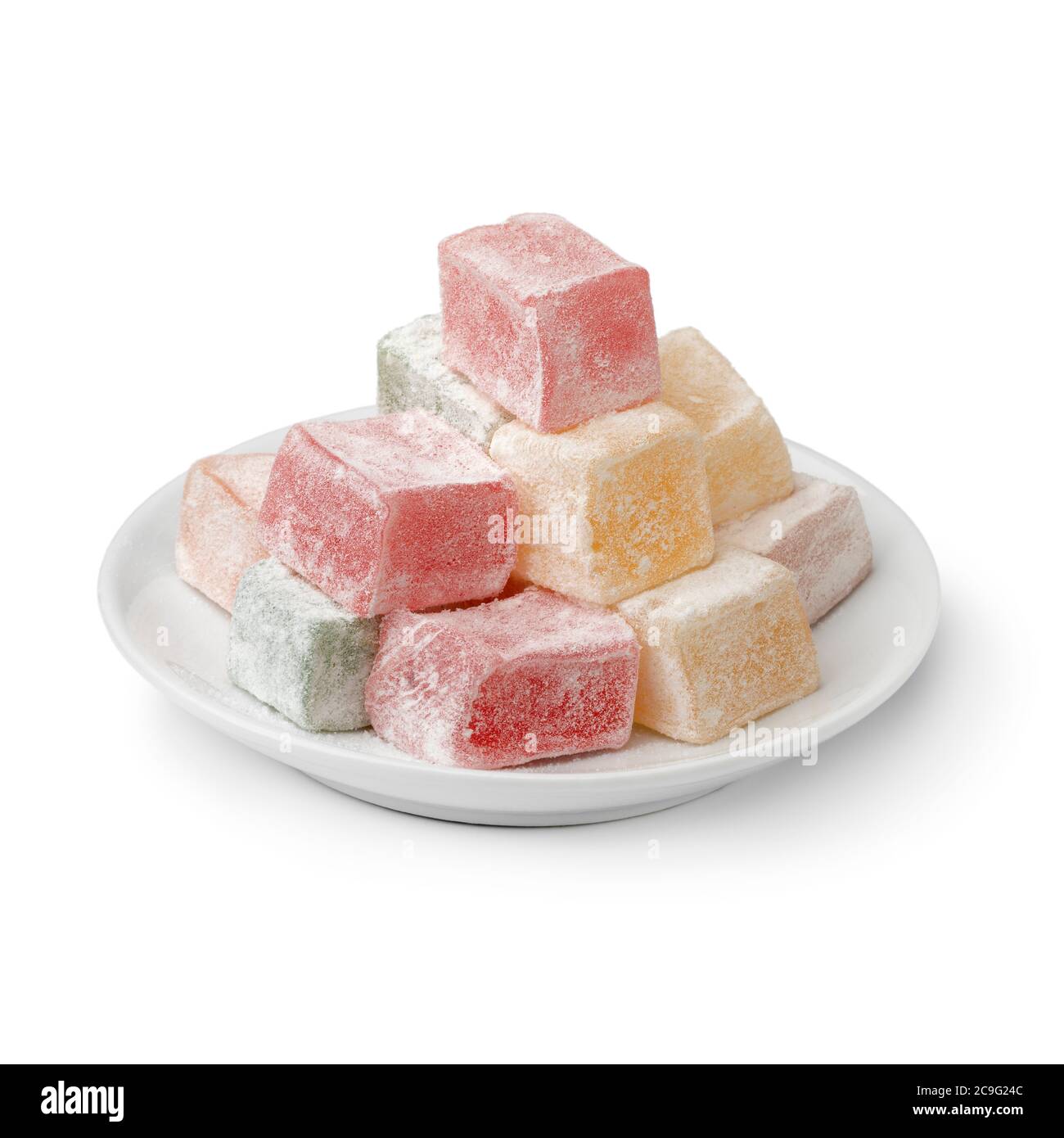 White dish Turkish delight with a variation of taste and color isolated on white background Stock Photo