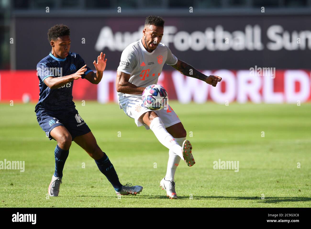 Marley Akt (Olympique Marseille left) versus Corentin Tolisso (FC Bayern  Munich) action, duels. Test game Audi Football Sumwith FC Bayern Munich - Olympique  Marseille on the FC Bayern campus on July 31, 2020. Season preparation  2020/2021 Photo ...