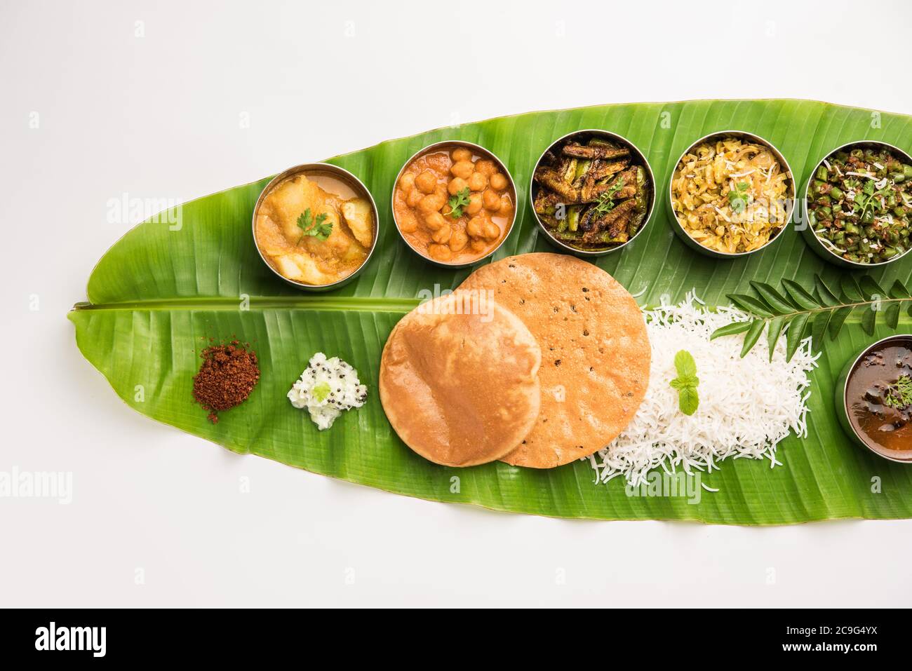 Traditional South Indian Meal or food served on big banana leaf, Food