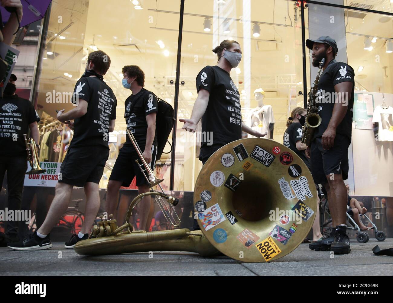 New York, United States. 31st July, 2020. People gather in Times Square for the 'Take Your Knee Off Our Necks March' in New York City on Friday, July 31, 2020. The 'Take Your Knee Off Our Necks March' is a protest of police brutality, black on black crime, institutionalized racism, discrimination, immigration, education equality, and youth resources. Photo by John Angelillo/UPI Credit: UPI/Alamy Live News Stock Photo