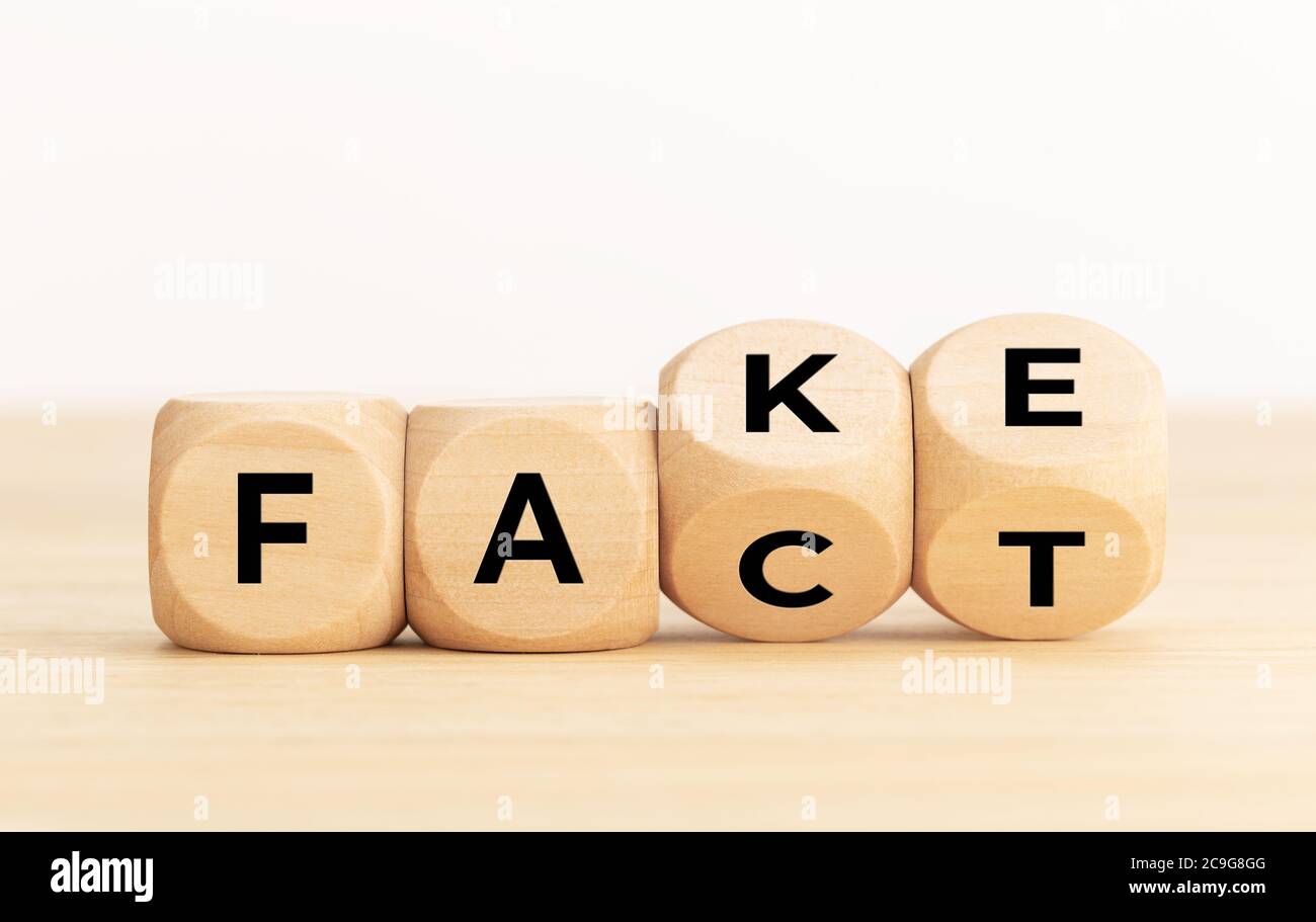 Fact or Fake concept. Wooden blocks with text. Copy space Stock Photo