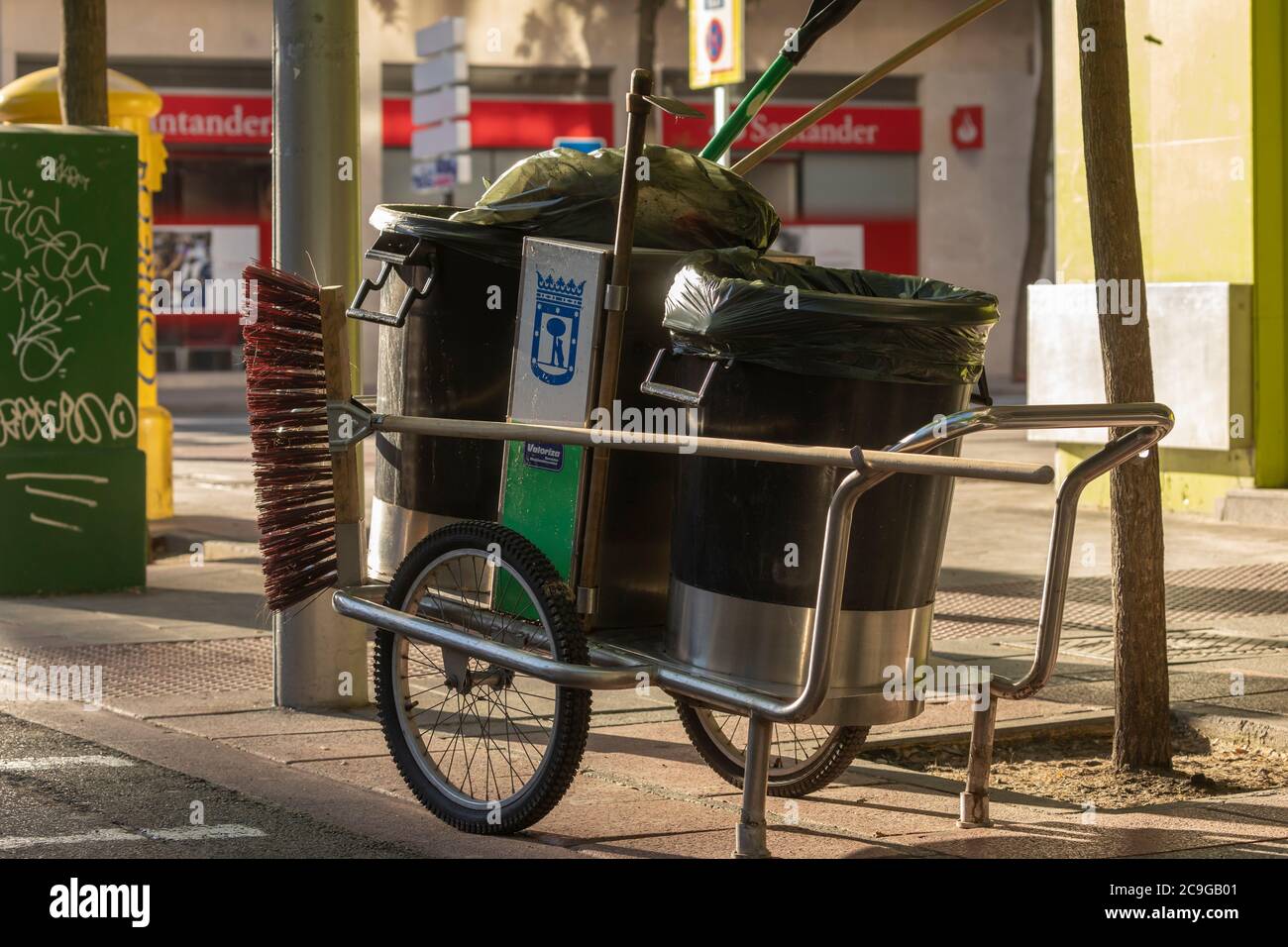 Madrid, Spain May 19, 2020 Cleaning cart, garbage cans and the