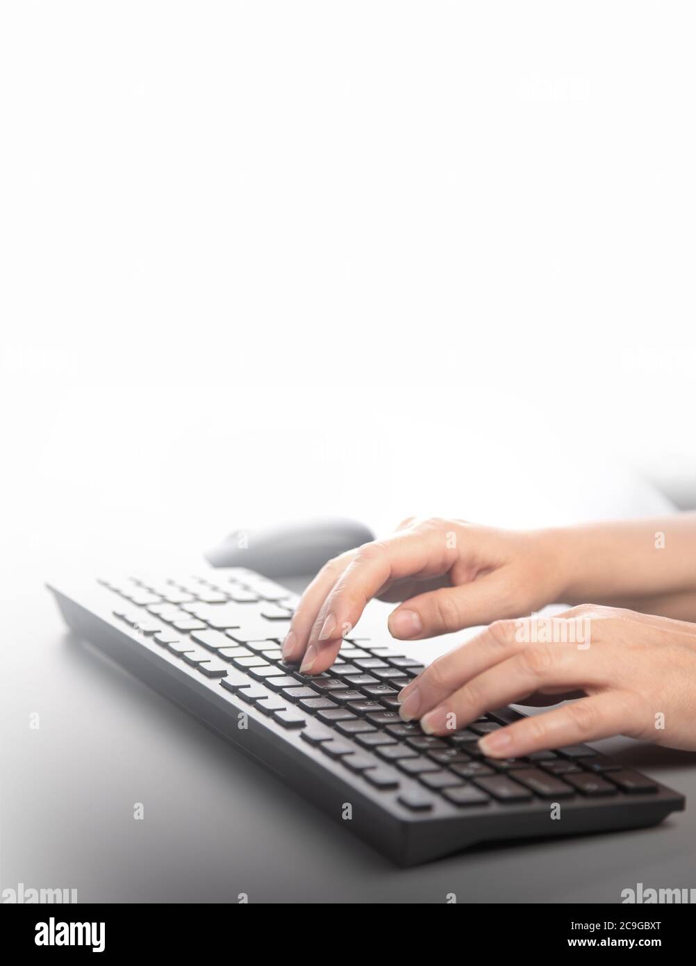 Business woman typing on keyboard. Copy space. Stock Photo