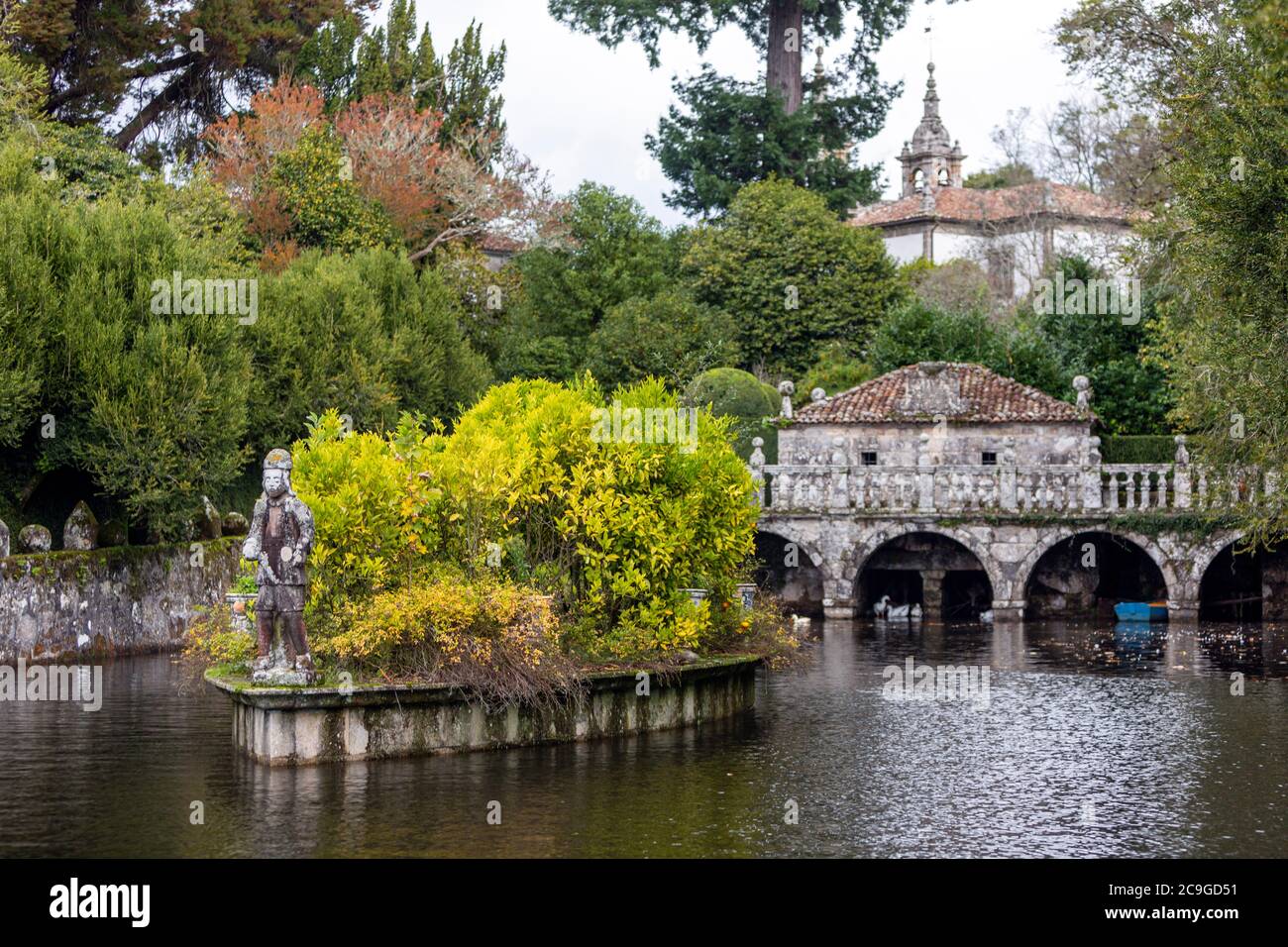 The Bridge and pond with the stone boat. , Pazo de Oca, A Estrada, Galicia, Spain Stock Photo