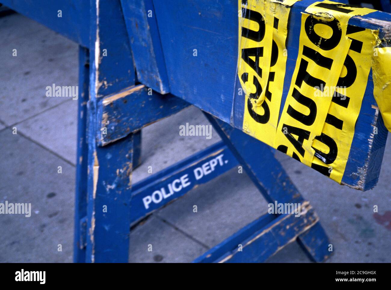 Police barrier with caution tape. Stock Photo