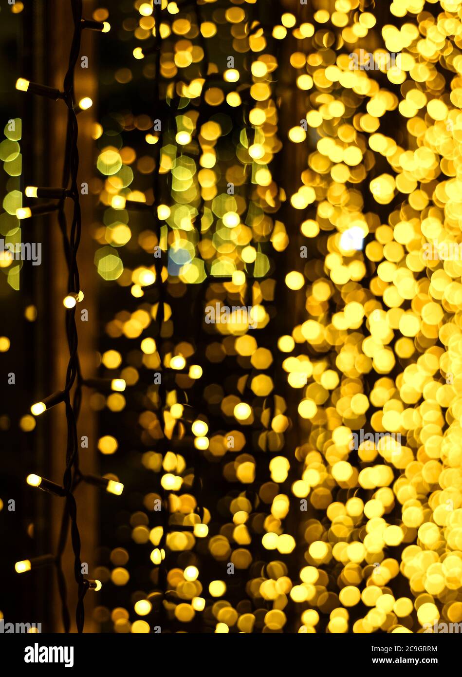 Christmas decoration made of glowing garland. New year illumination