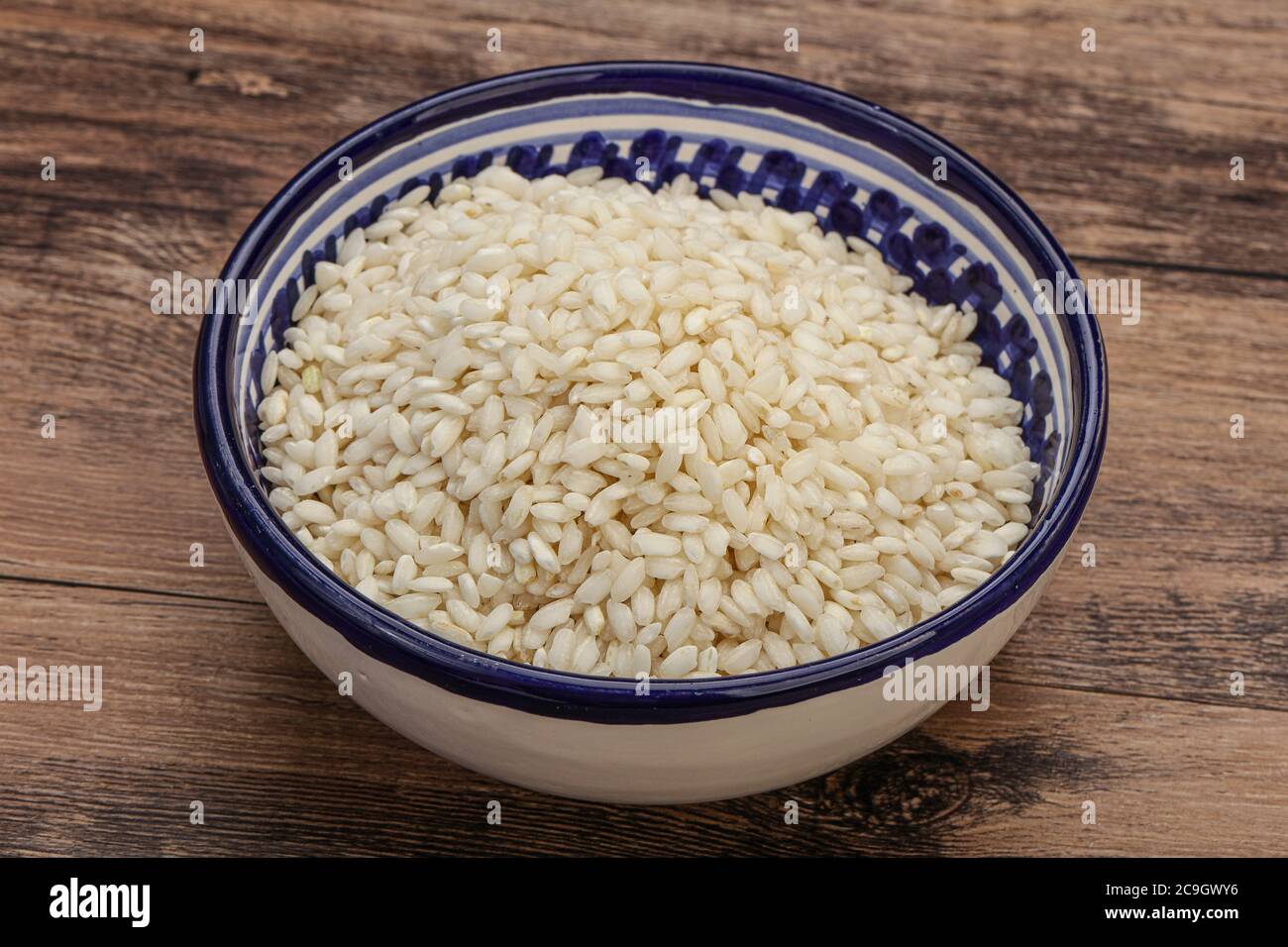 Raw Italian arborio rice for Risotto Stock Photo - Alamy