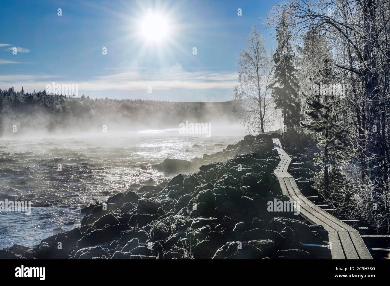 Autumn atmosphere with fog on the river in the evening light, Gaellivare, Norrbottens laen, Sweden Stock Photo