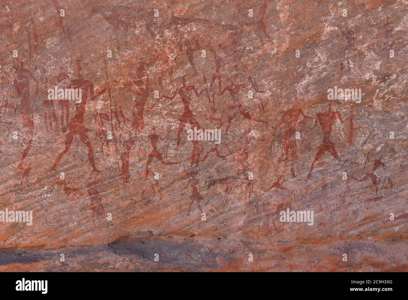 PREHISTORIC ROCK ART AND ENGRAVINGS IN ALGERIA, The Tadrart Rouge and Tassili n’Ajjer  in the SAHARA DESERT. Stock Photo