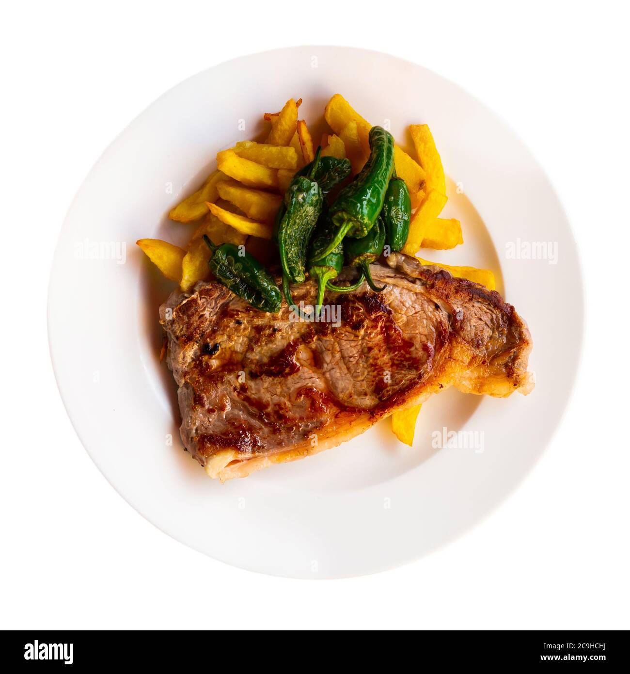 Tasty steak of beef sirloin served with French fried potatoes and baked ...