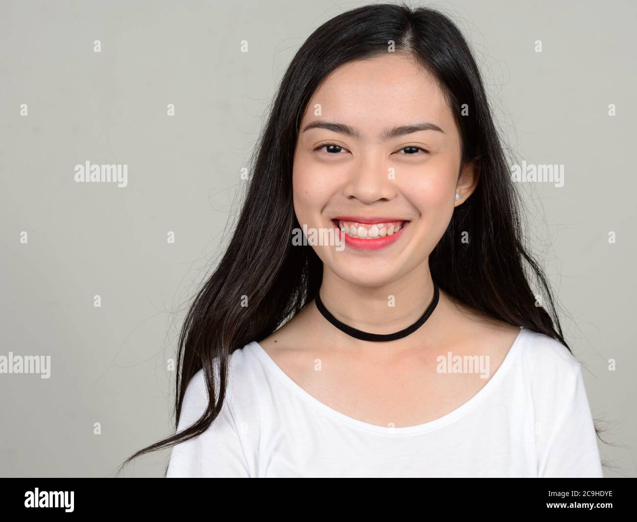 Portrait of happy young beautiful Asian woman Stock Photo - Alamy