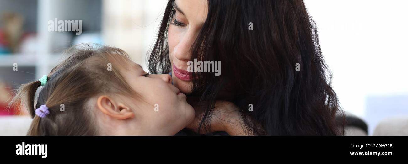 Warm relationship between mum and kid Stock Photo