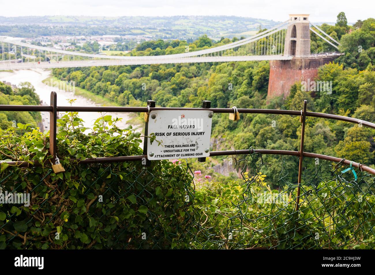 Fall hazard sign at a viewing point, Isambard Kingdom Brunel Clifton Suspension Bridge over the Avon Gorge, between Clifton and Leigh Woods in North S Stock Photo