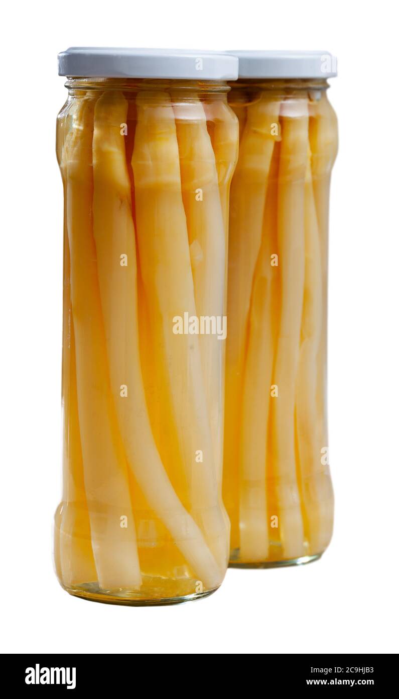 Vegetarian appetizer of canned white asparagus in glass jar. Homemade