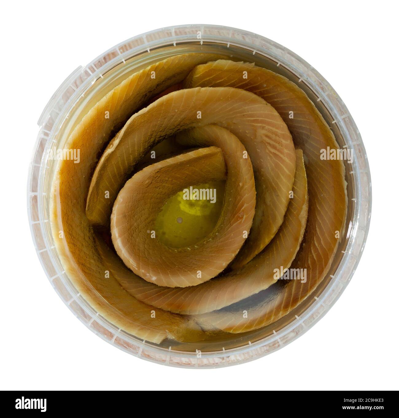 Preserved sardines marinated in oil in plastic container﻿. Isolated over white background Stock