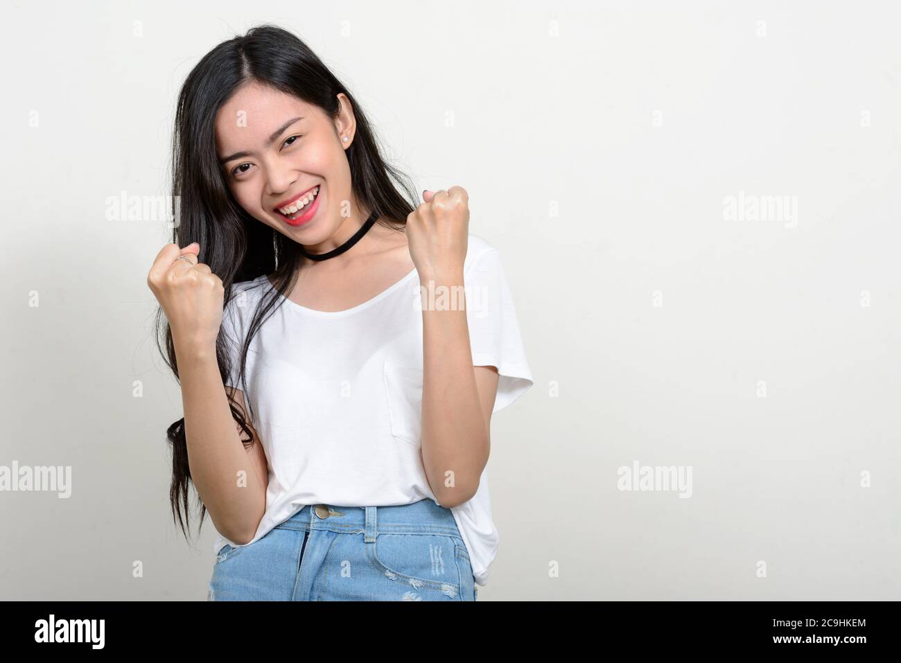 Portrait of happy young beautiful Asian woman Stock Photo - Alamy
