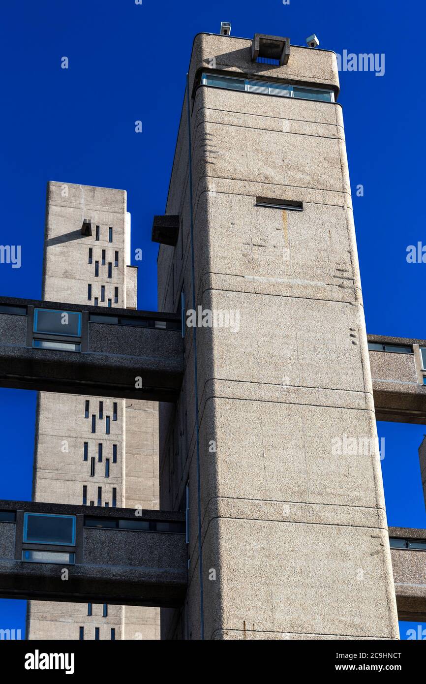 Exterior detail of brutalist Carradale House on Brownfield Estate with Balfron service tower in the background, Poplar, London, UK Stock Photo