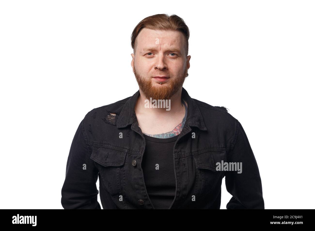 Photo of bearded man in black jeans jacket Stock Photo