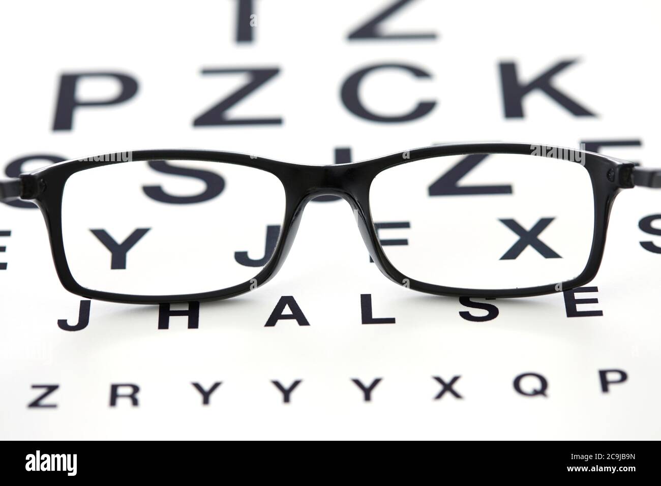 Sight chart and spectacles. Stock Photo