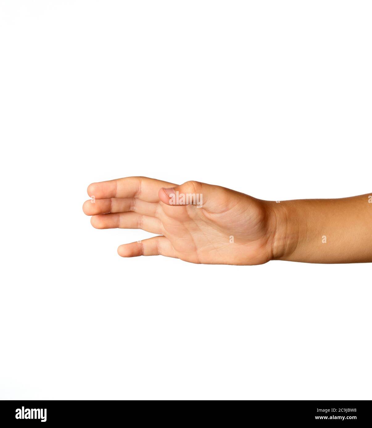 Child's hand against a plain white background. Stock Photo
