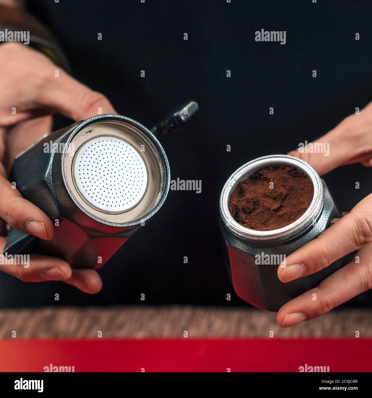 Making Coffee with Stovetop Moka Pot. Female Barista putting ground