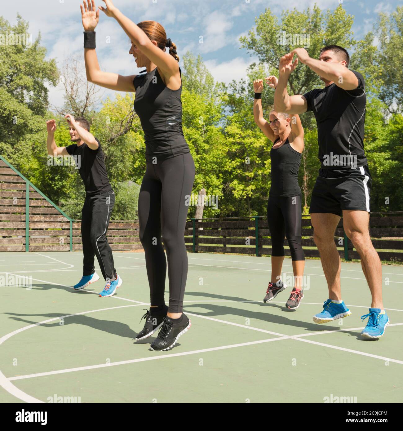 Aerobics Group Of People In Vigorous Exercise Stock Photo Alamy