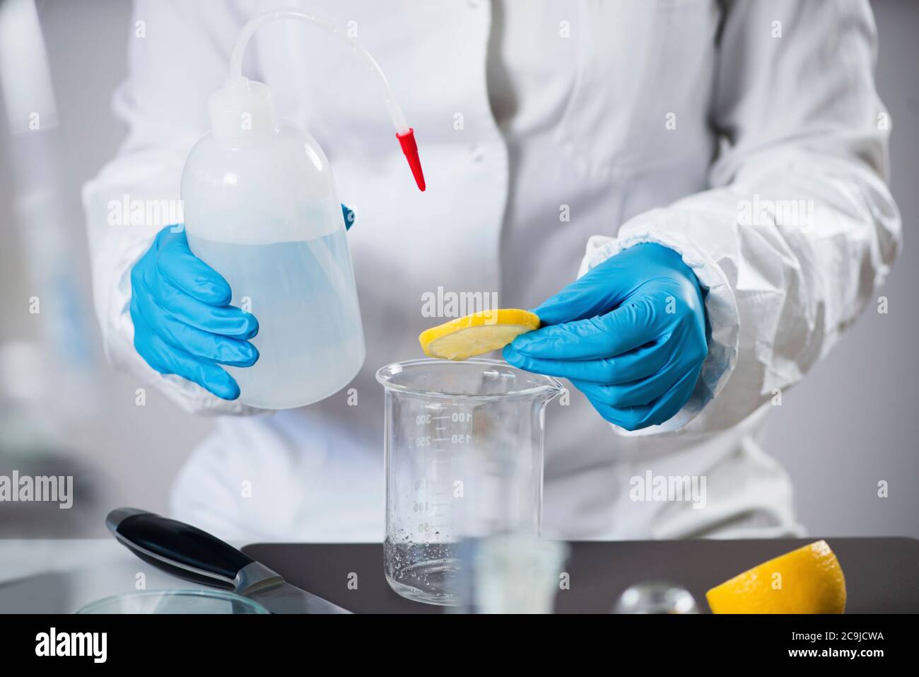 Food safety inspector testing fruit Stock Photo Alamy