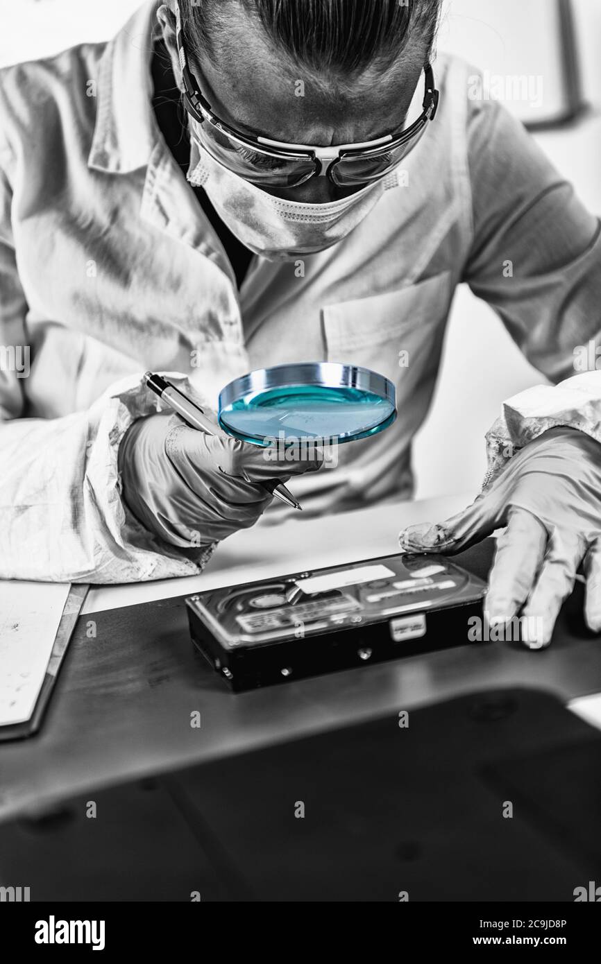 Forensic Science Data Forensic Analyst Examining Laptop Computer Stock ...
