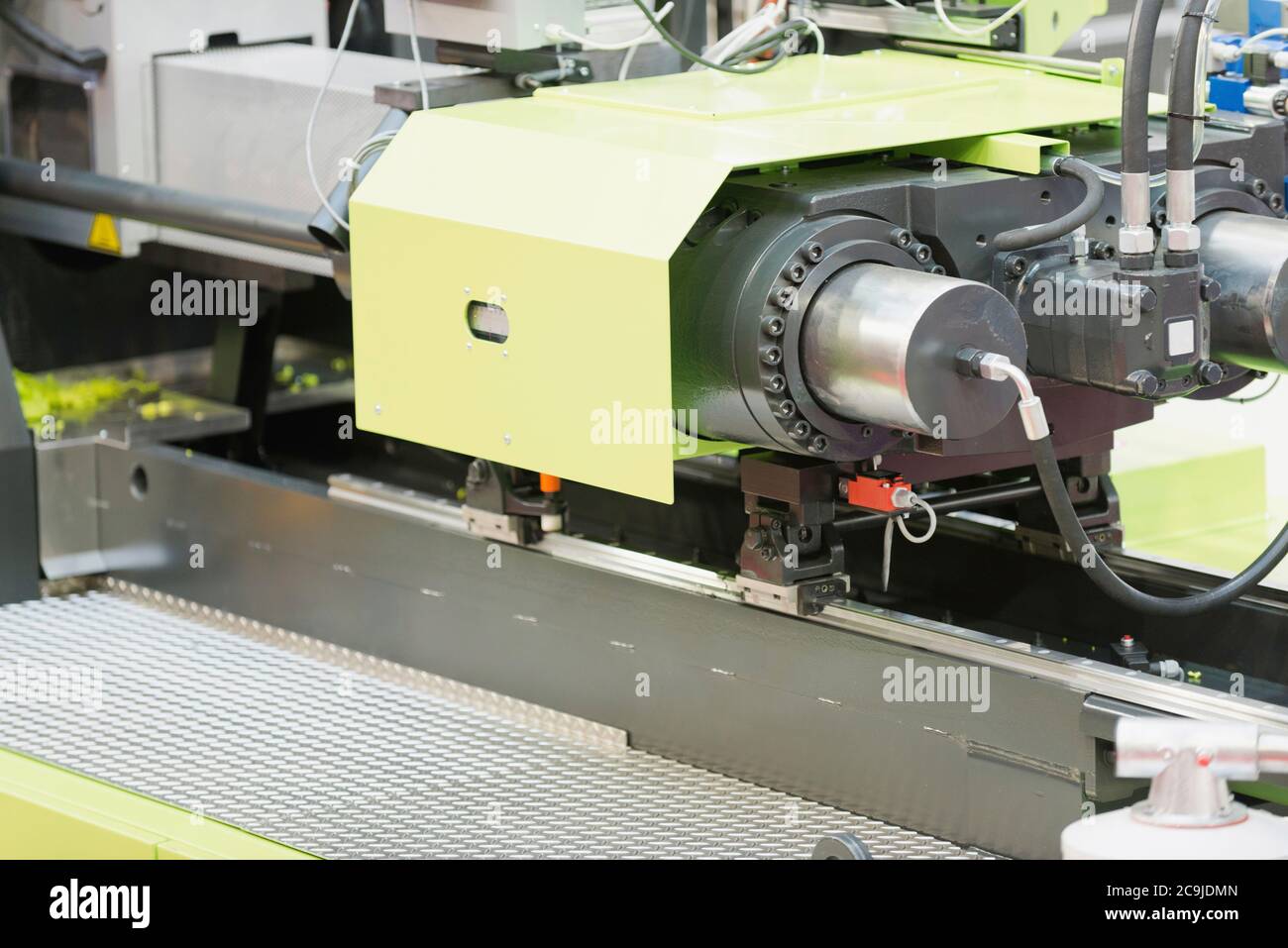 Industrial plastic injecting machine. Stock Photo